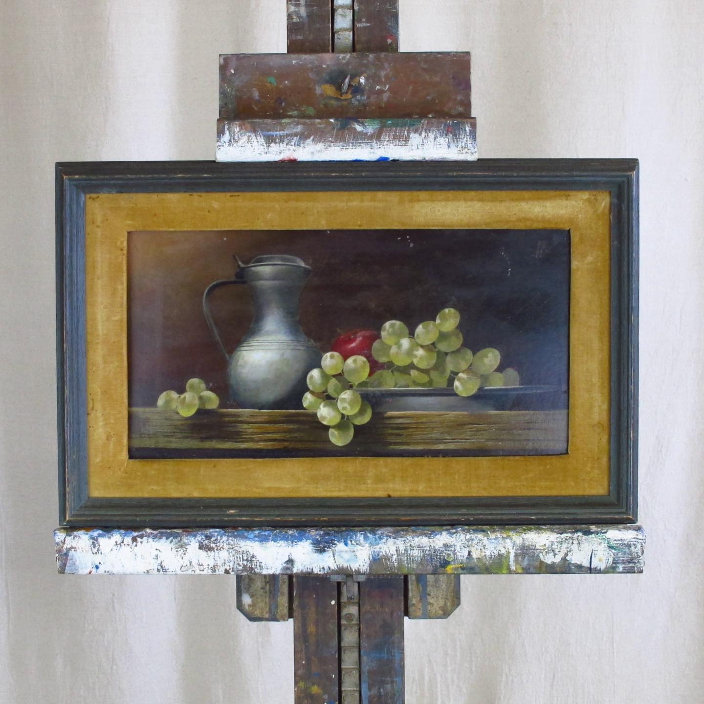 AV Signed French Trompe l'Oeil Still Life Painting on Board of Grapes,and Apple, Pewter, Wooden Tabletop, c. 1920