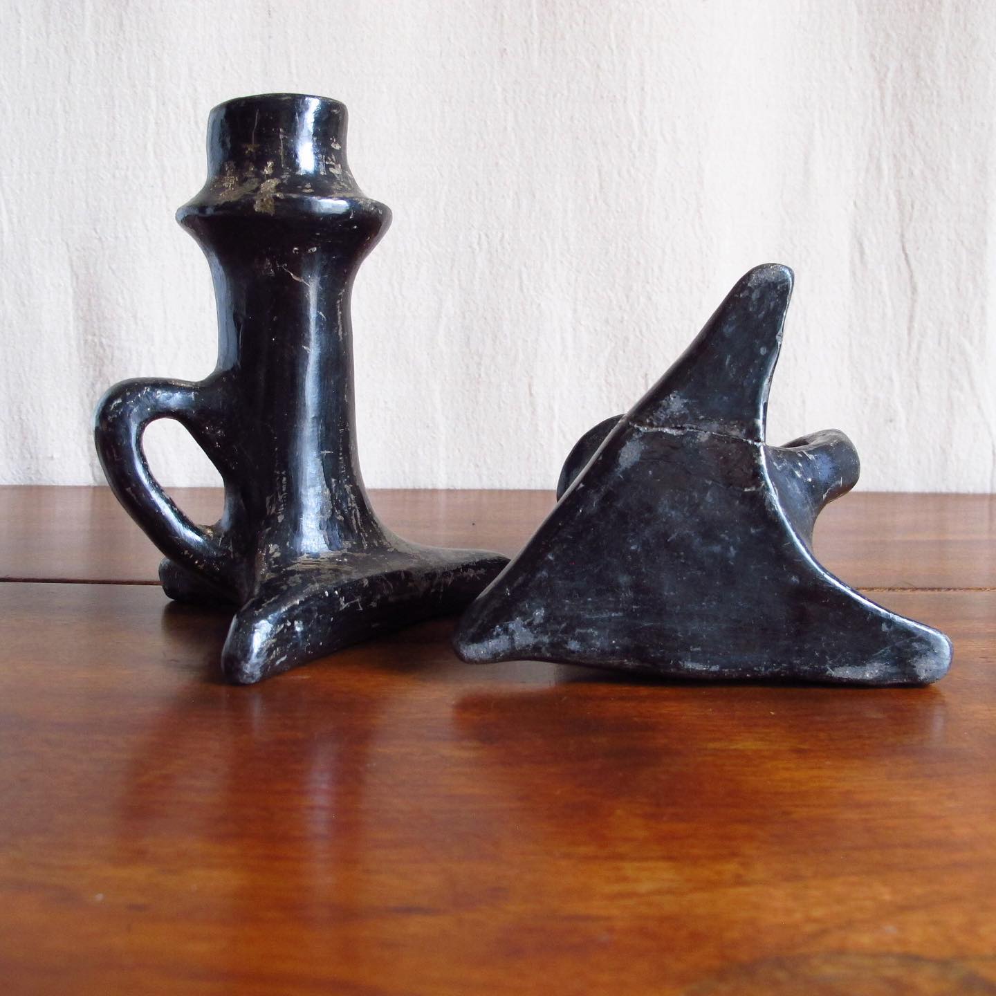 Pair of Southwest Santa Clara black Native American pottery candlesticks, c. 1920