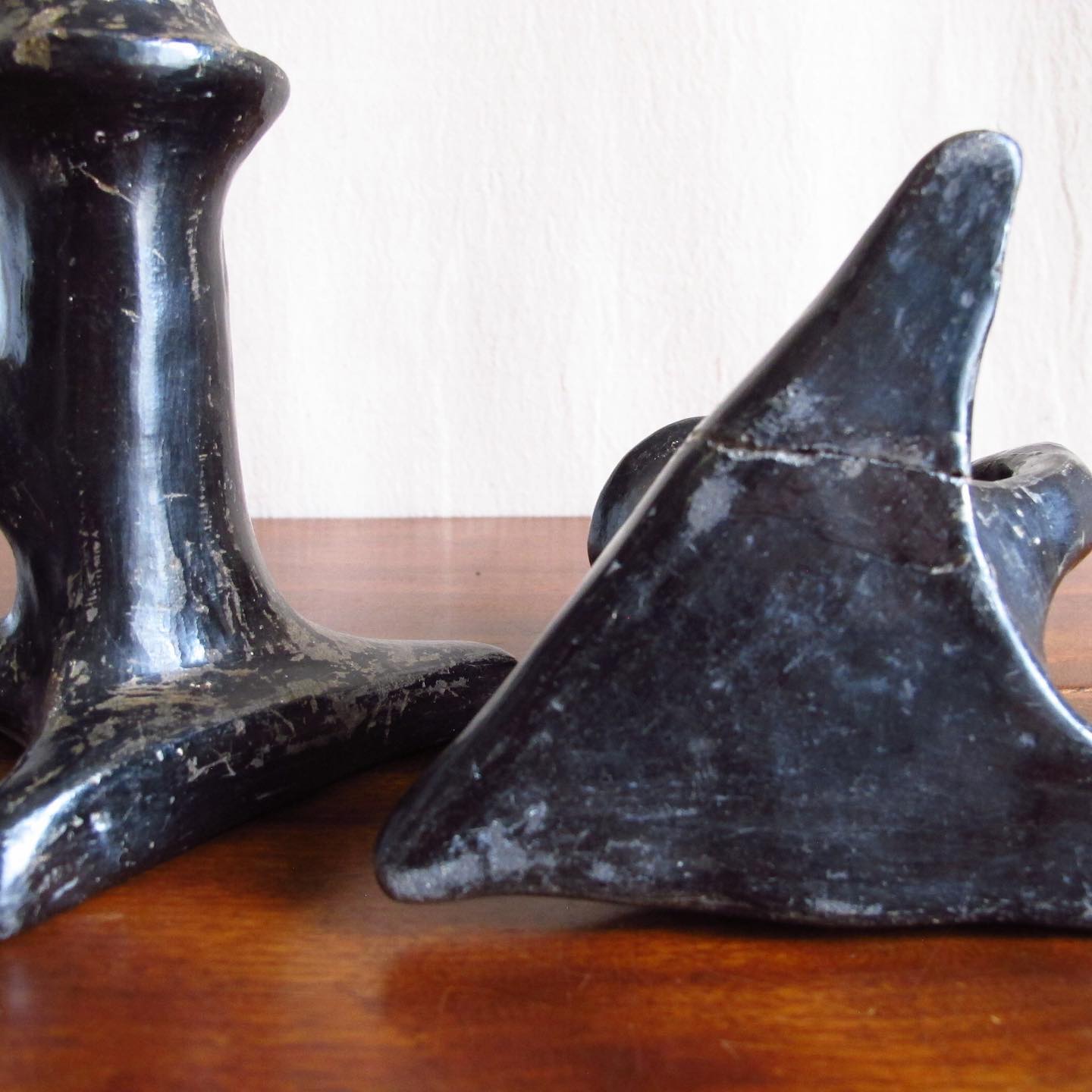 Pair of Southwest Santa Clara black Native American pottery candlesticks, c. 1920