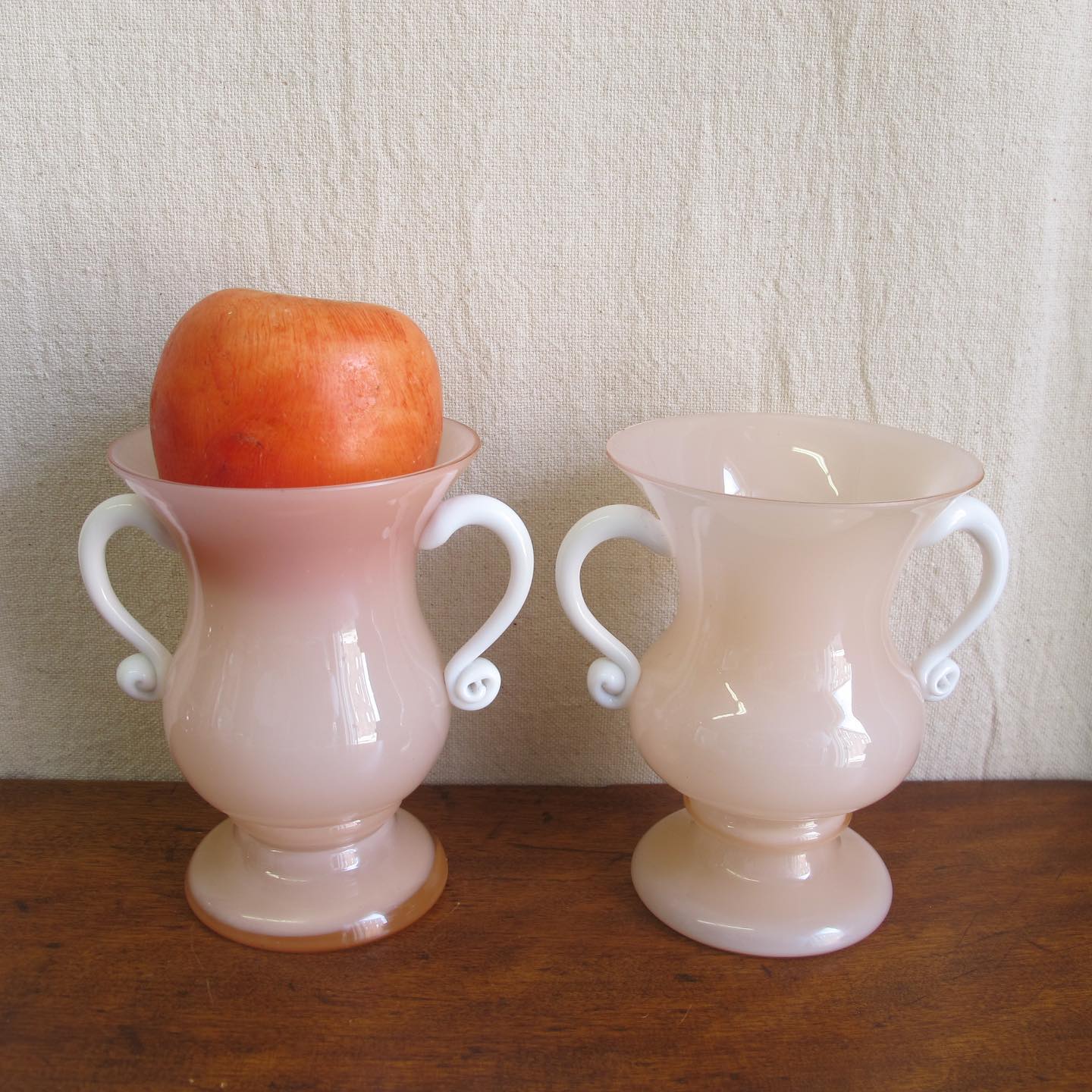 Pair of Czech art glass urn-form vases in shell pink opaline glass, c. 1920 1930