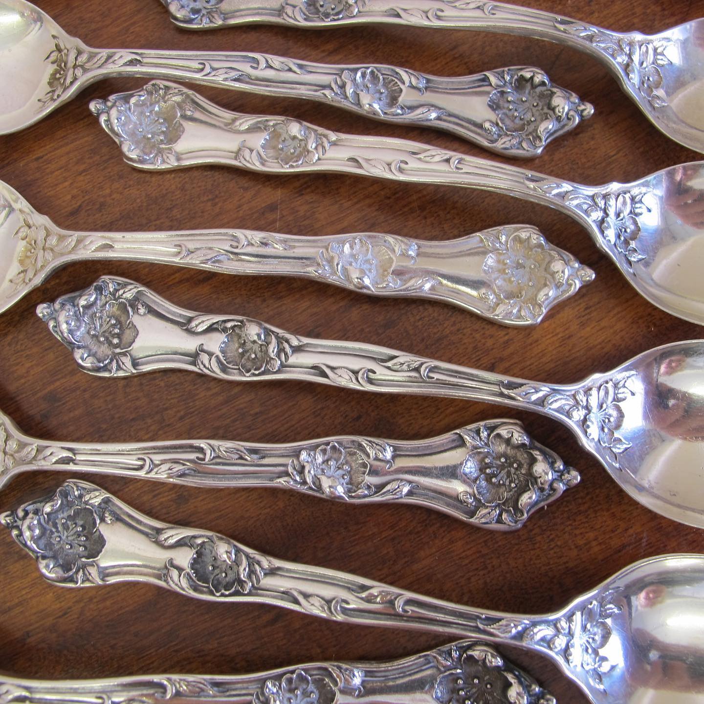 Ten Art Nouveau sterling silver Reed & Barton teaspoons, c. 1900, ‘Poppies’ pattern or possibly the ‘Les 5 Fleurs'