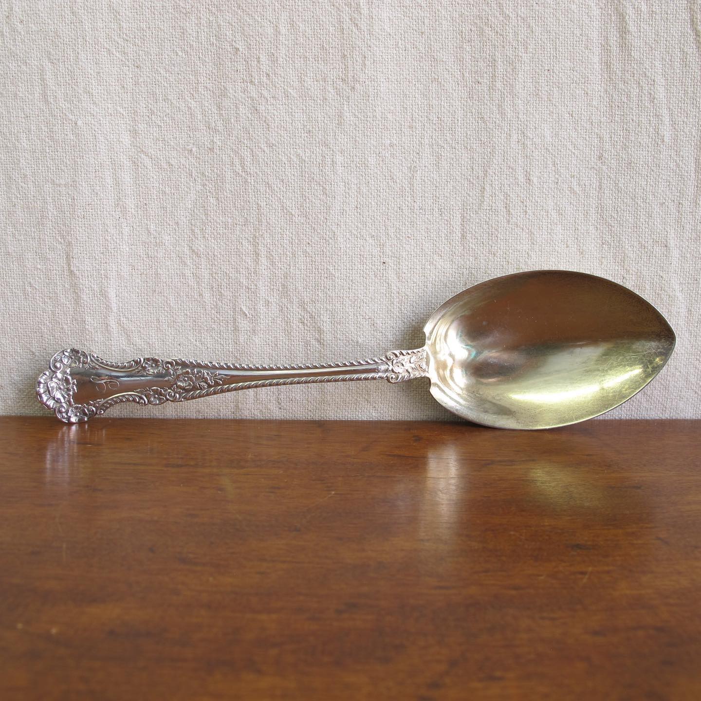 Large Victorian Gorham sterling silver ‘Cambridge’ salad or serving spoon, lobed bowl with remnants of a gold wash, dated 1899