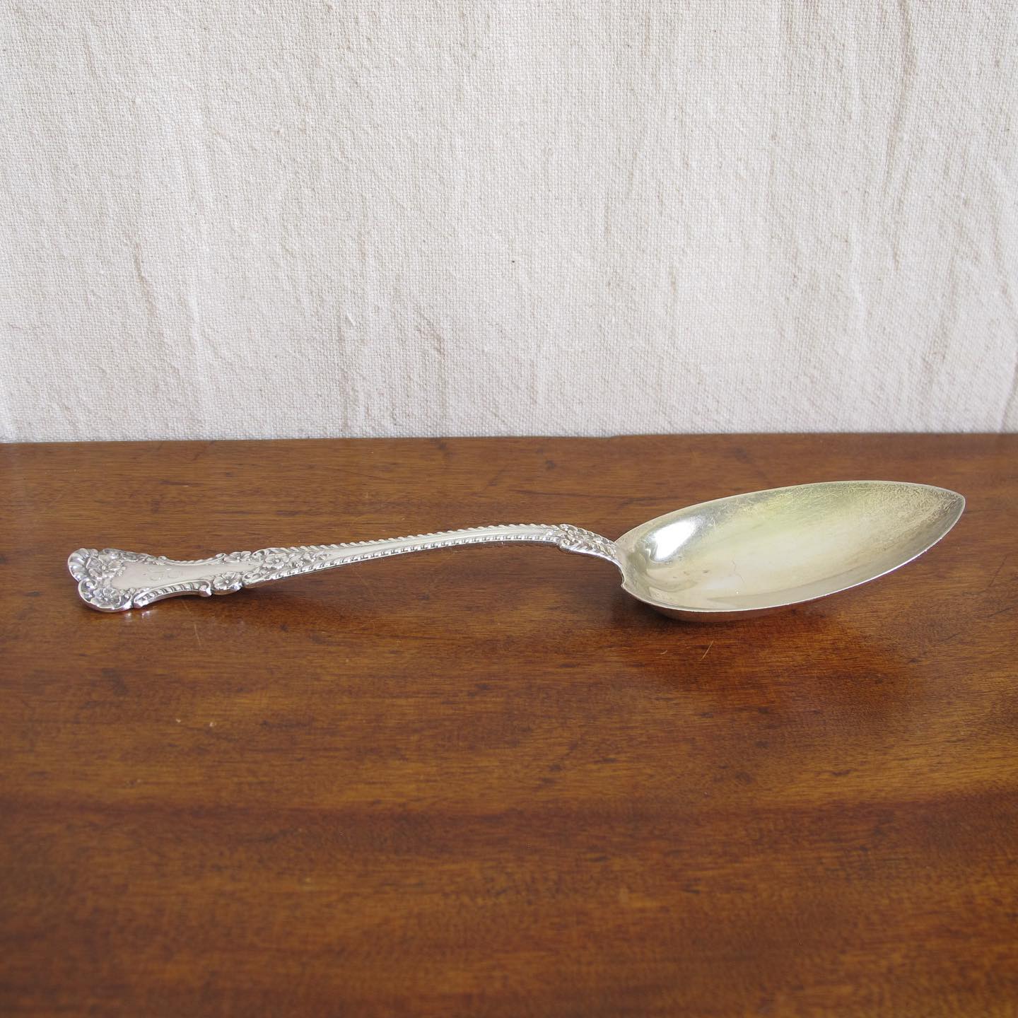 Large Victorian Gorham sterling silver ‘Cambridge’ salad or serving spoon, lobed bowl with remnants of a gold wash, dated 1899