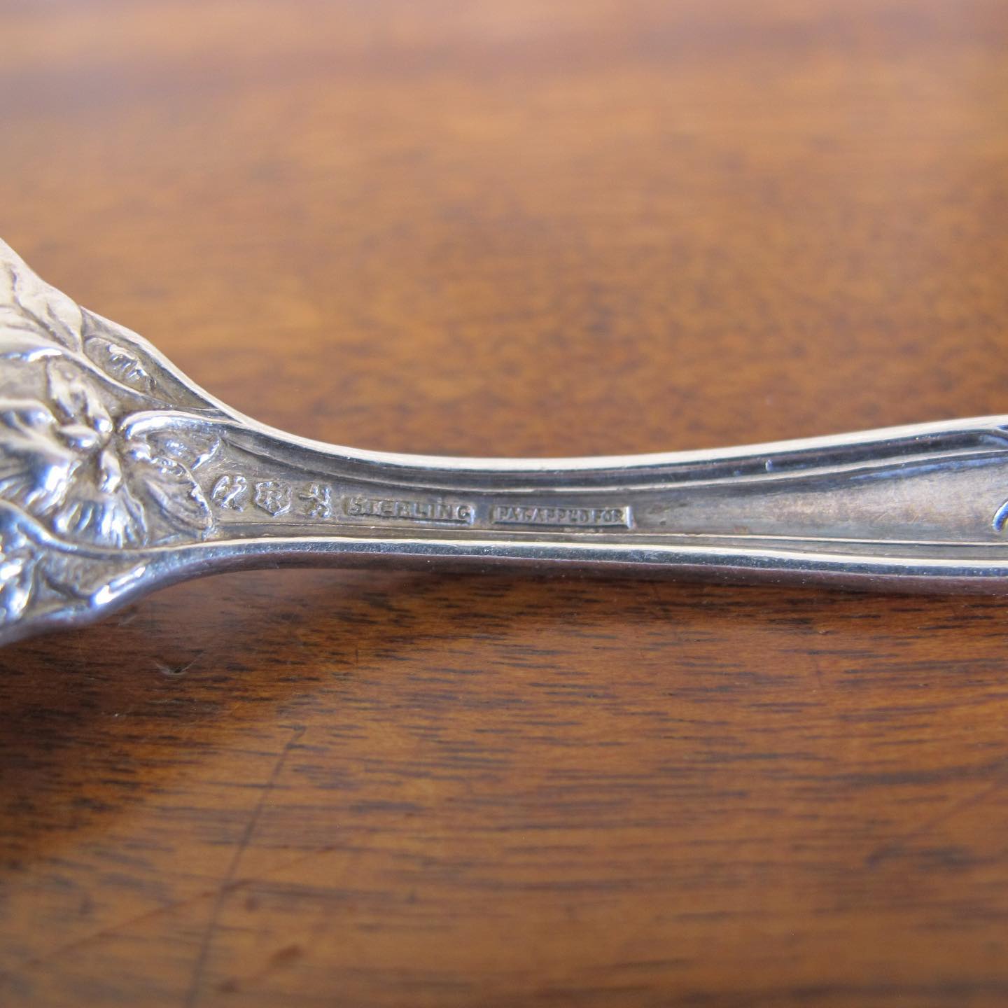 Ten Art Nouveau sterling silver Reed & Barton teaspoons, c. 1900, ‘Poppies’ pattern or possibly the ‘Les 5 Fleurs'