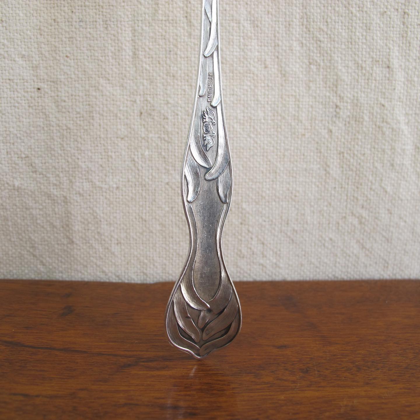 Sterling spoon slotted with stars, handle with daffodils in extraordinary detail, by MANCHESTER MFG. CO, c. 1905