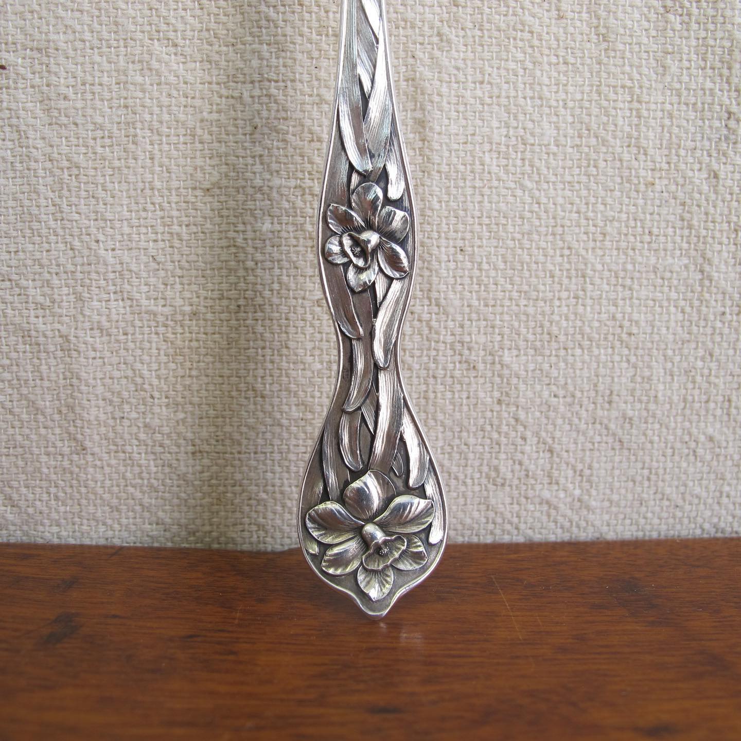 Sterling spoon slotted with stars, handle with daffodils in extraordinary detail, by MANCHESTER MFG. CO, c. 1905