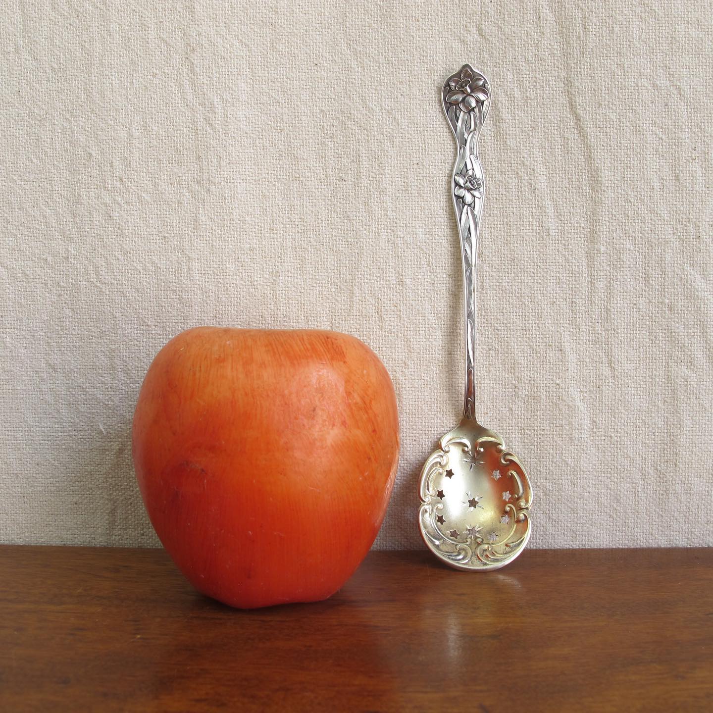 Sterling spoon slotted with stars, handle with daffodils in extraordinary detail, by MANCHESTER MFG. CO, c. 1905