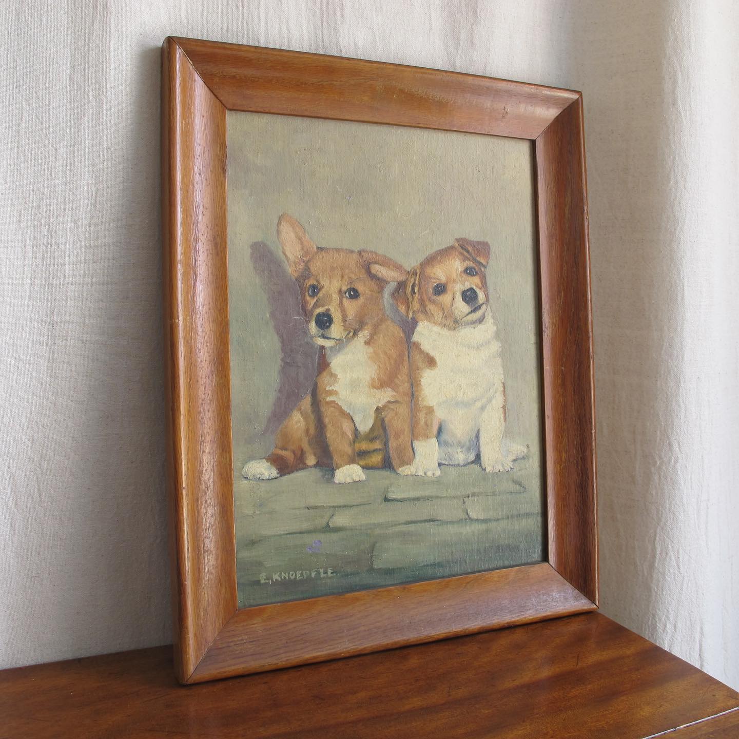 Puppy Dogs Oil on Canvas, one a corgi the other a terrier, artist signed E. KNOEPFLE, c. 1940