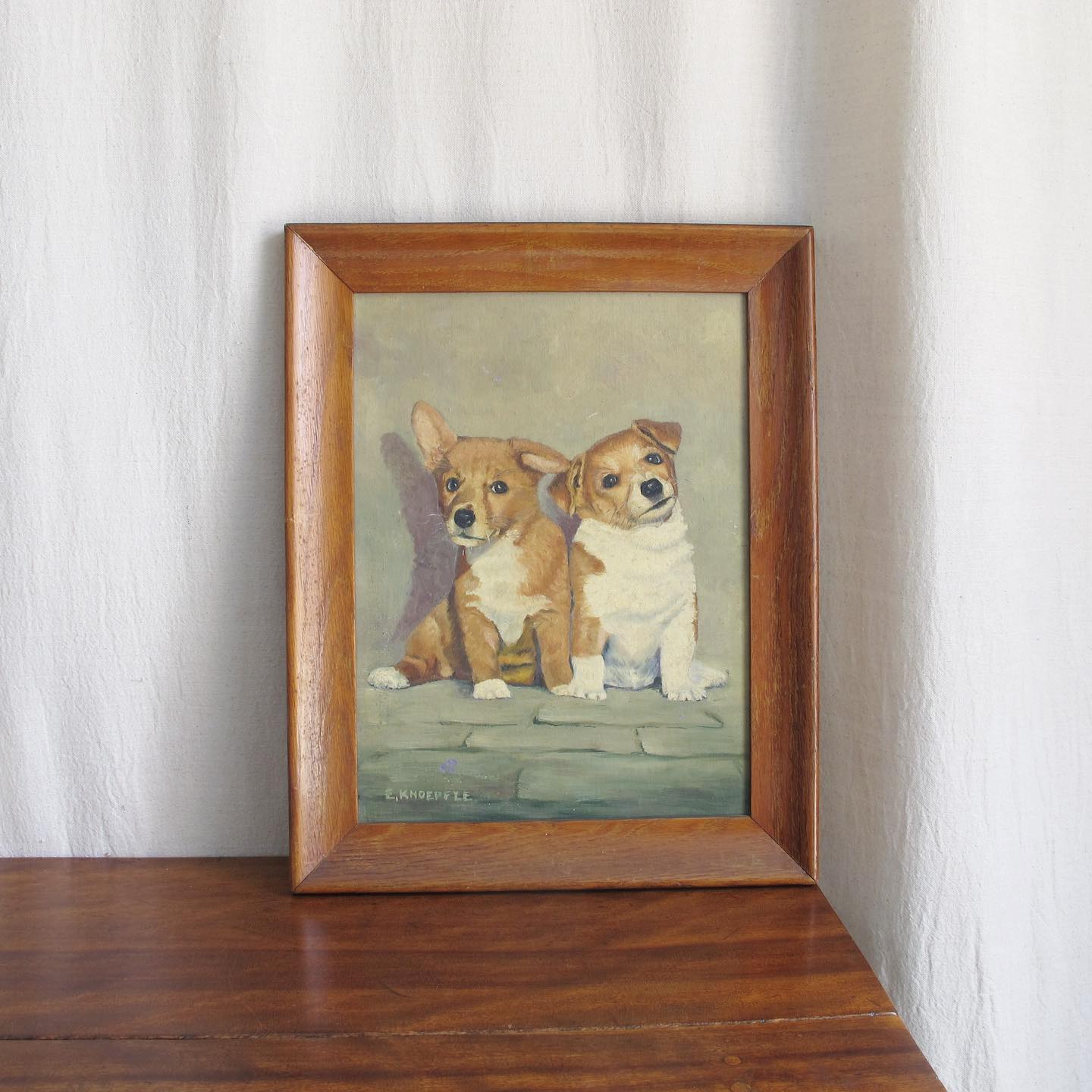 Puppy Dogs Oil on Canvas, one a corgi the other a terrier, artist signed E. KNOEPFLE, c. 1940