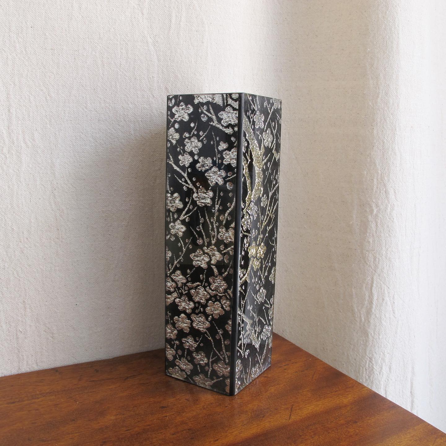 Japanese vase composed of fine metallic kimono silk encased in glass, made by Kano, c.1970