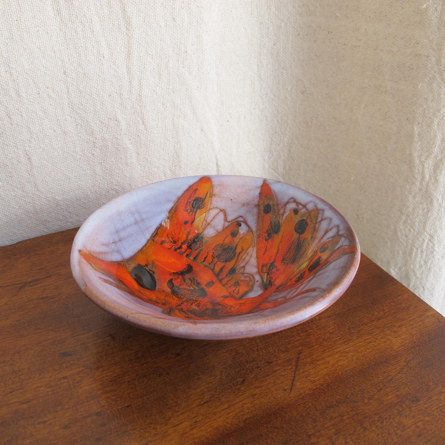 Vallauris French art pottery dish or bowl with goldfish or koi carp in brightly colored orange majolica glazes c. 1950 1960