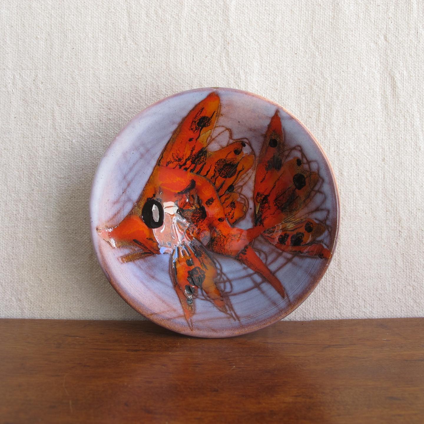 Vallauris French art pottery dish or bowl with goldfish or koi carp in brightly colored orange majolica glazes c. 1950 1960