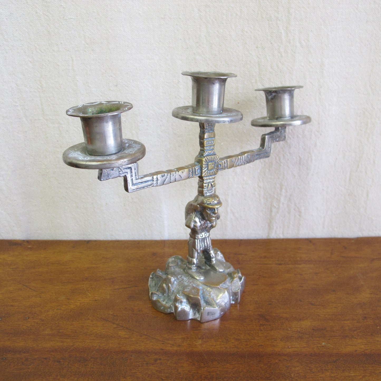 Aztec Revival candelabra with miner as Atlas, solid brass and nickel, c. 1920