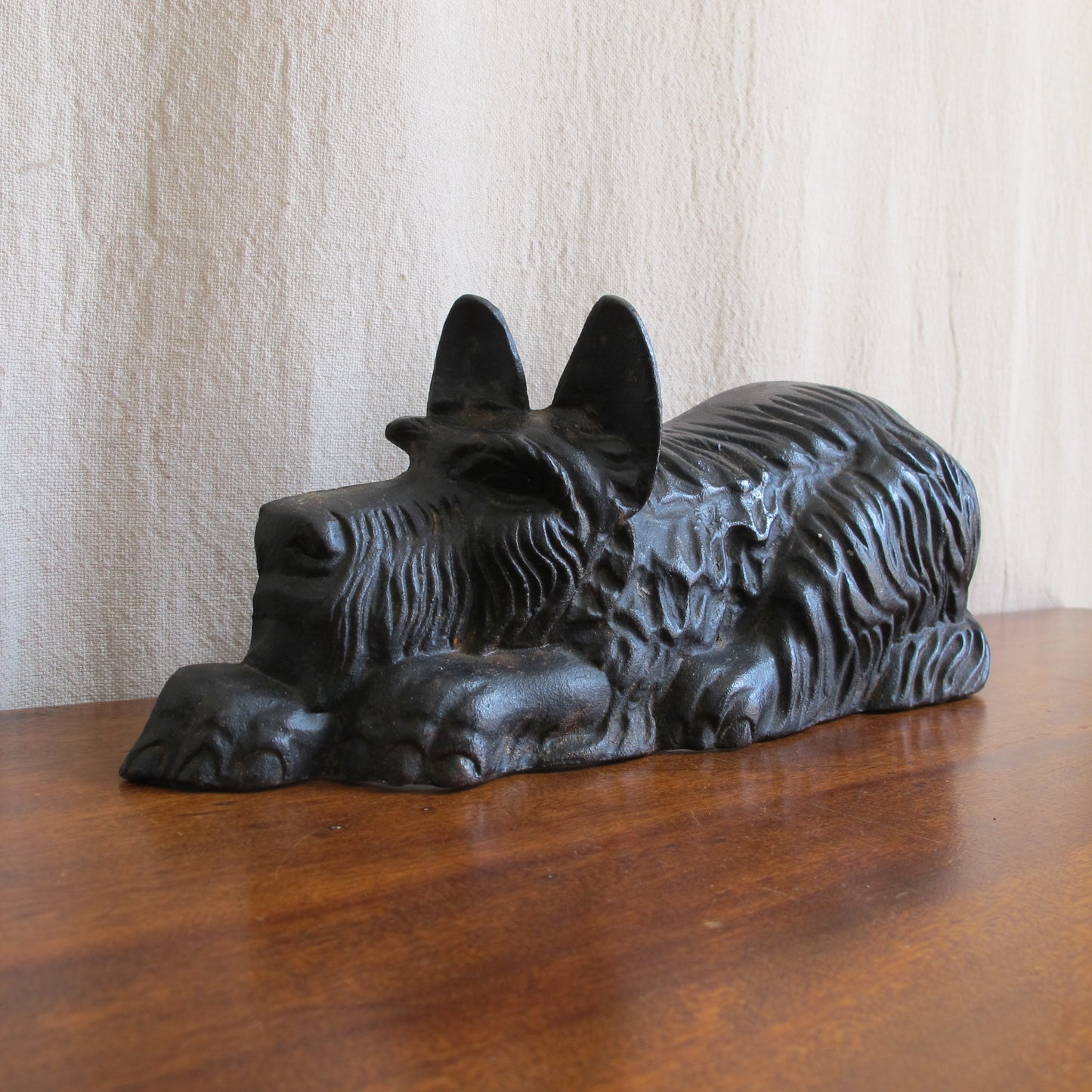 Recumbent Scottie cast iron dog doorstop, 1920 1930 vintage antique