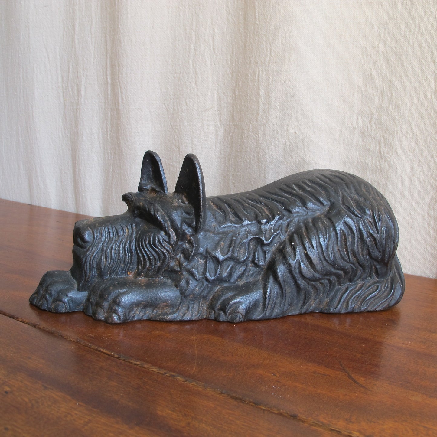 Recumbent Scottie cast iron dog doorstop, 1920 1930 vintage antique