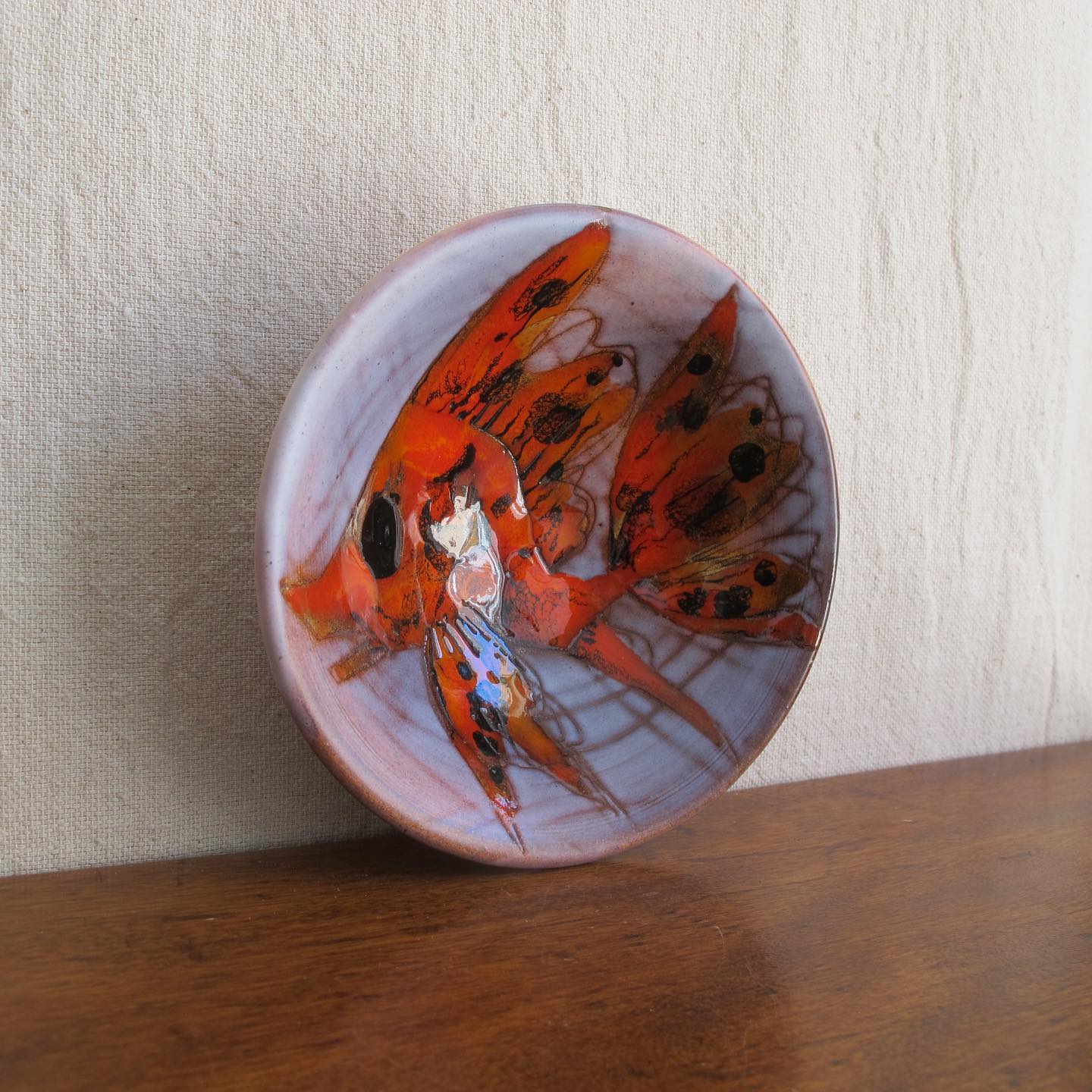 Vallauris French art pottery dish or bowl with goldfish or koi carp in brightly colored orange majolica glazes c. 1950 1960