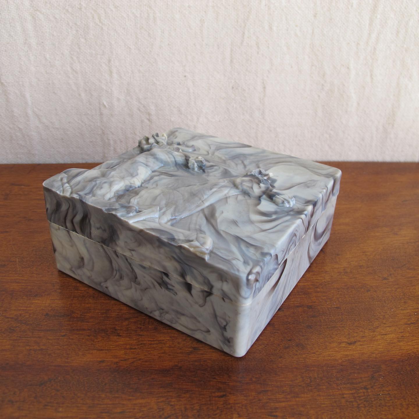 Early marbled celluloid box with relief of deer to the lid by Hickok, c. 1940s