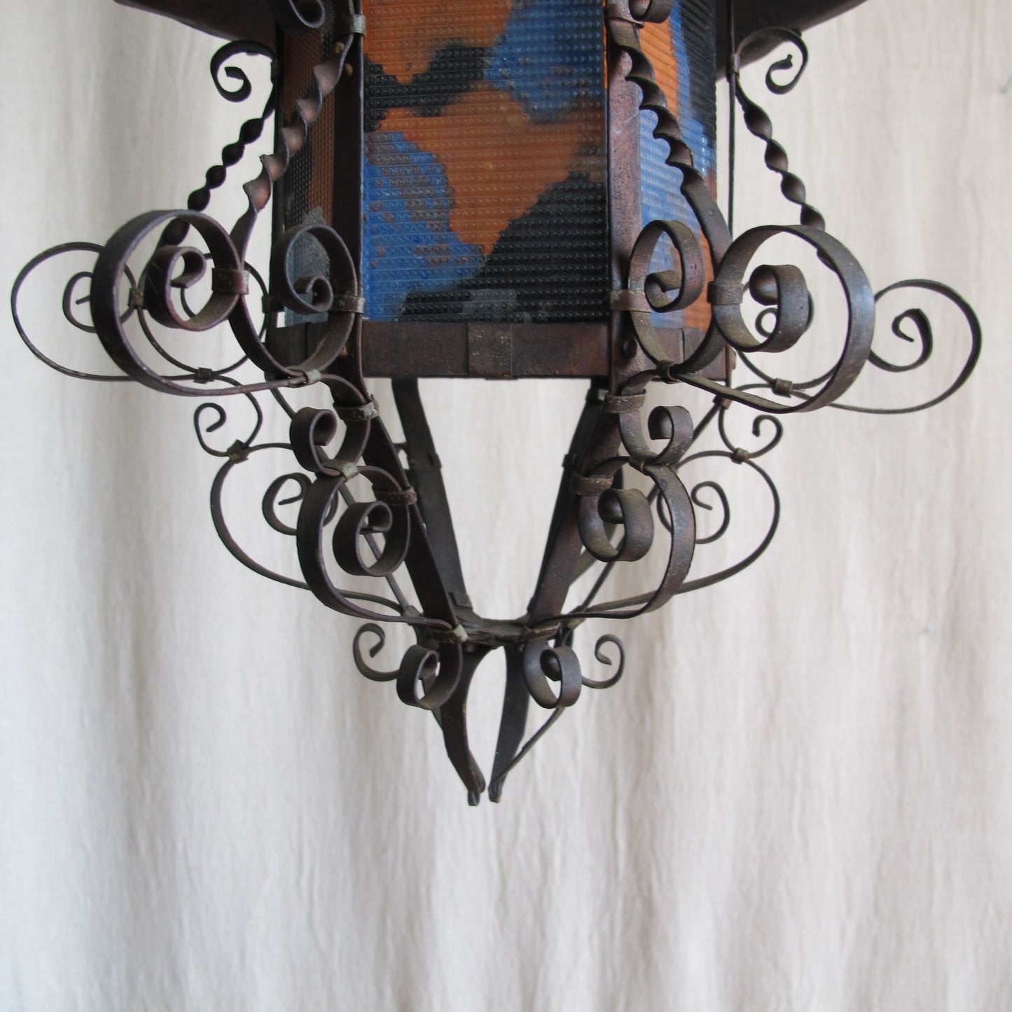 Rare 1920s California Spanish Colonial lantern in delicately wrought copper and reverse painted glass