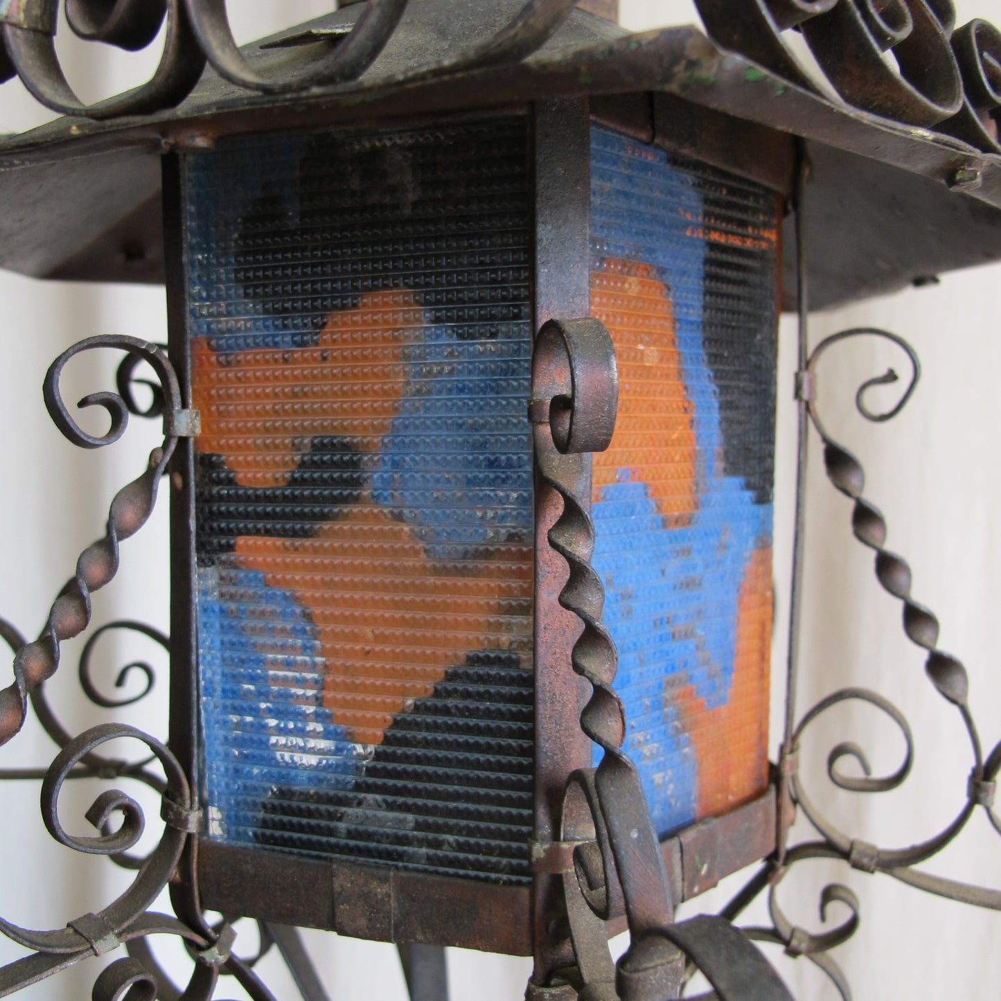 Rare 1920s California Spanish Colonial lantern in delicately wrought copper and reverse painted glass