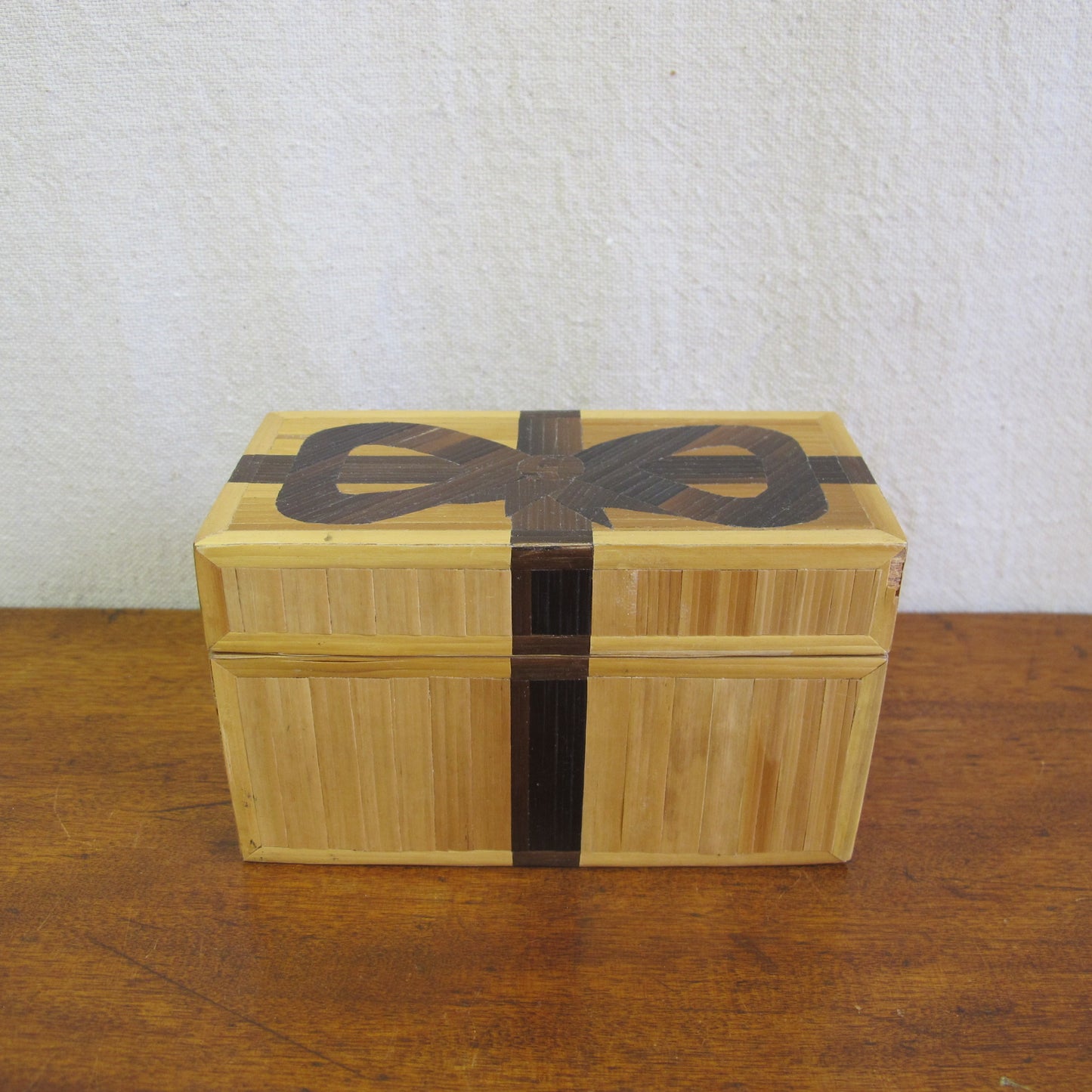 French straw marquetry box made by Rochas in the form of a gift box with bow, c. 1970