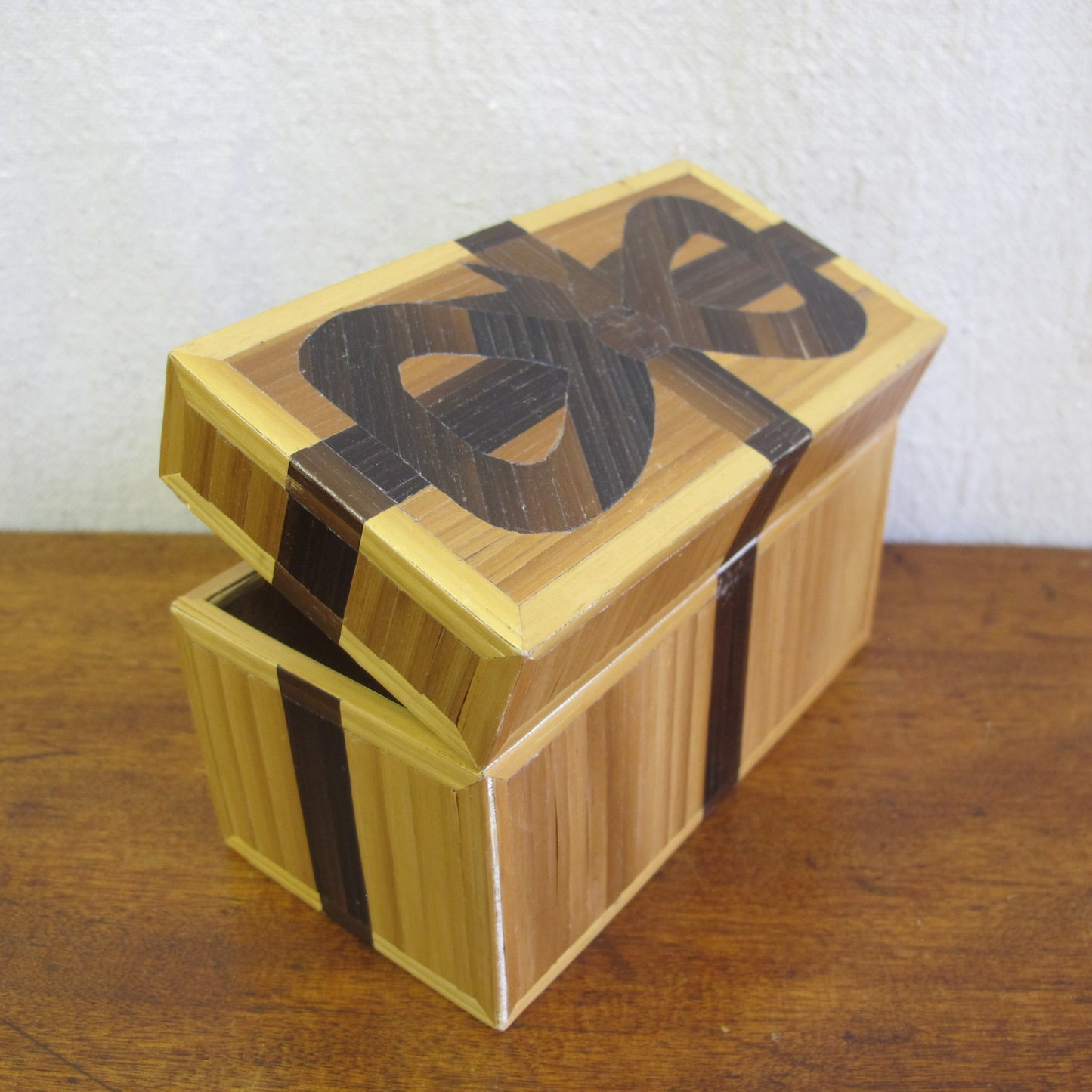 French straw marquetry box made by Rochas in the form of a gift box with bow, c. 1970