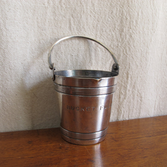 Cocktail jigger engraved "BUCKET FULL," in the form of a miniature bucket, up to 4 oz., silverplate by Napier, c. 1930