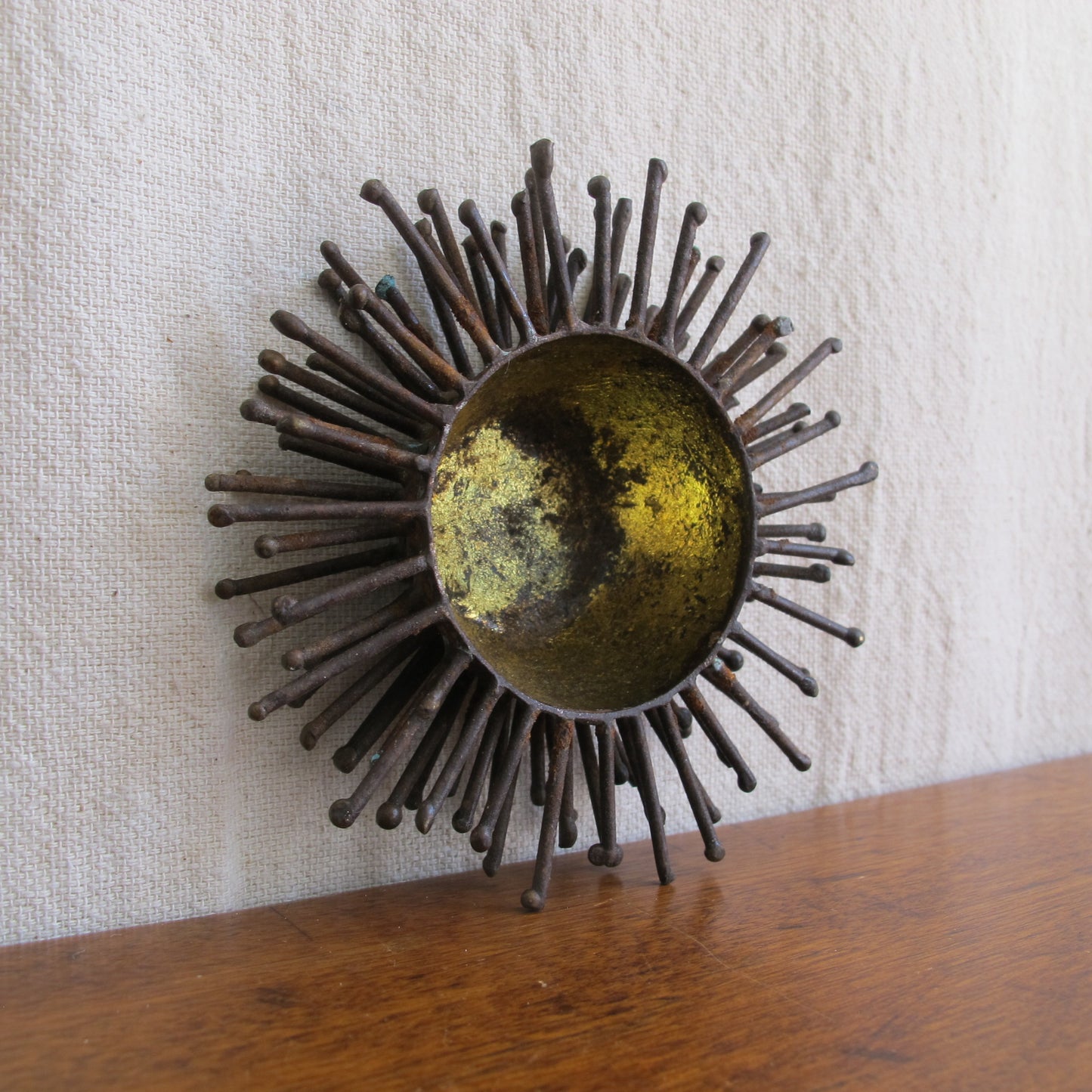 Brutalist spiked bowl with gilded interior, rather like a sea urchin, sculptural on the table or wall, c. 1970