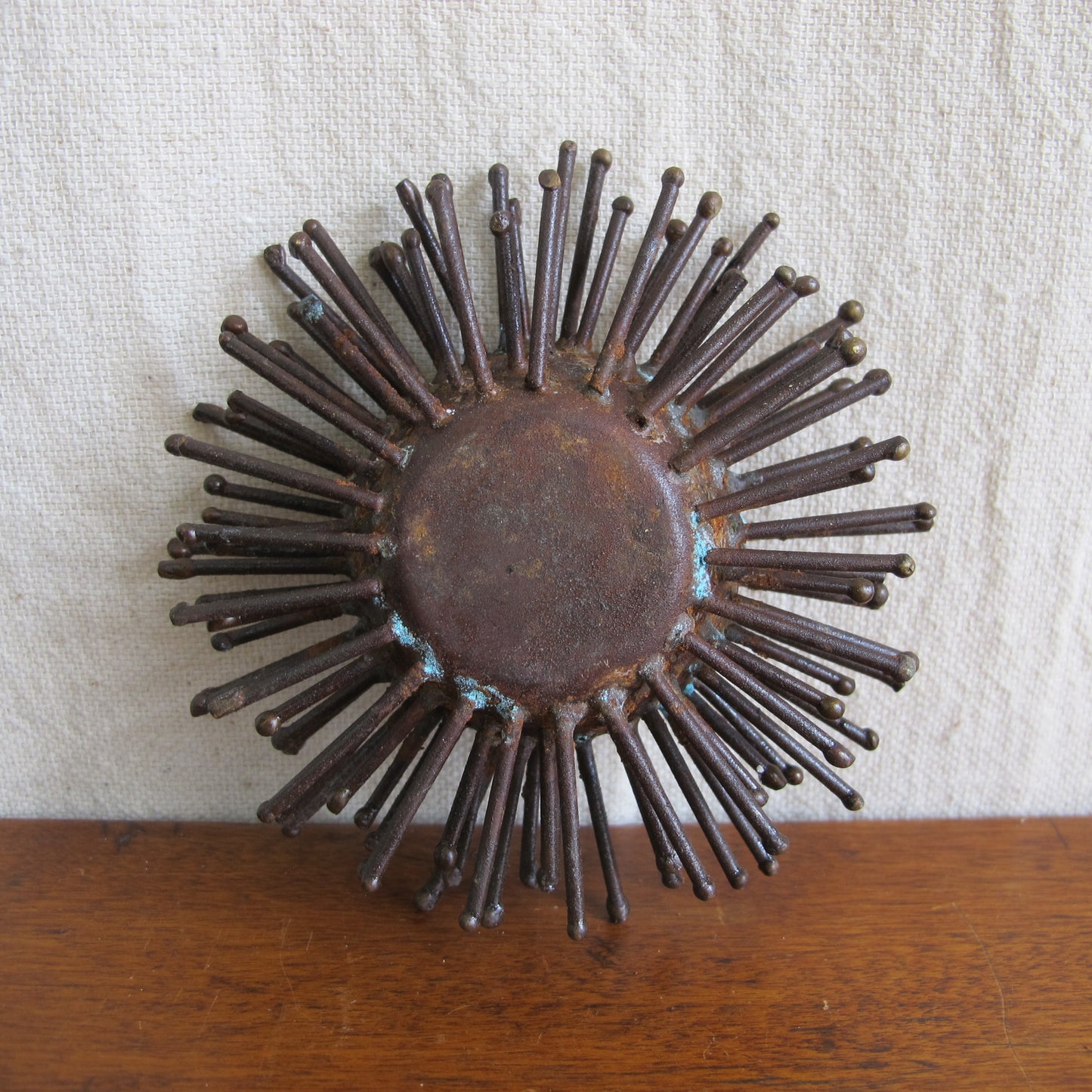 Brutalist spiked bowl with gilded interior, rather like a sea urchin, sculptural on the table or wall, c. 1970