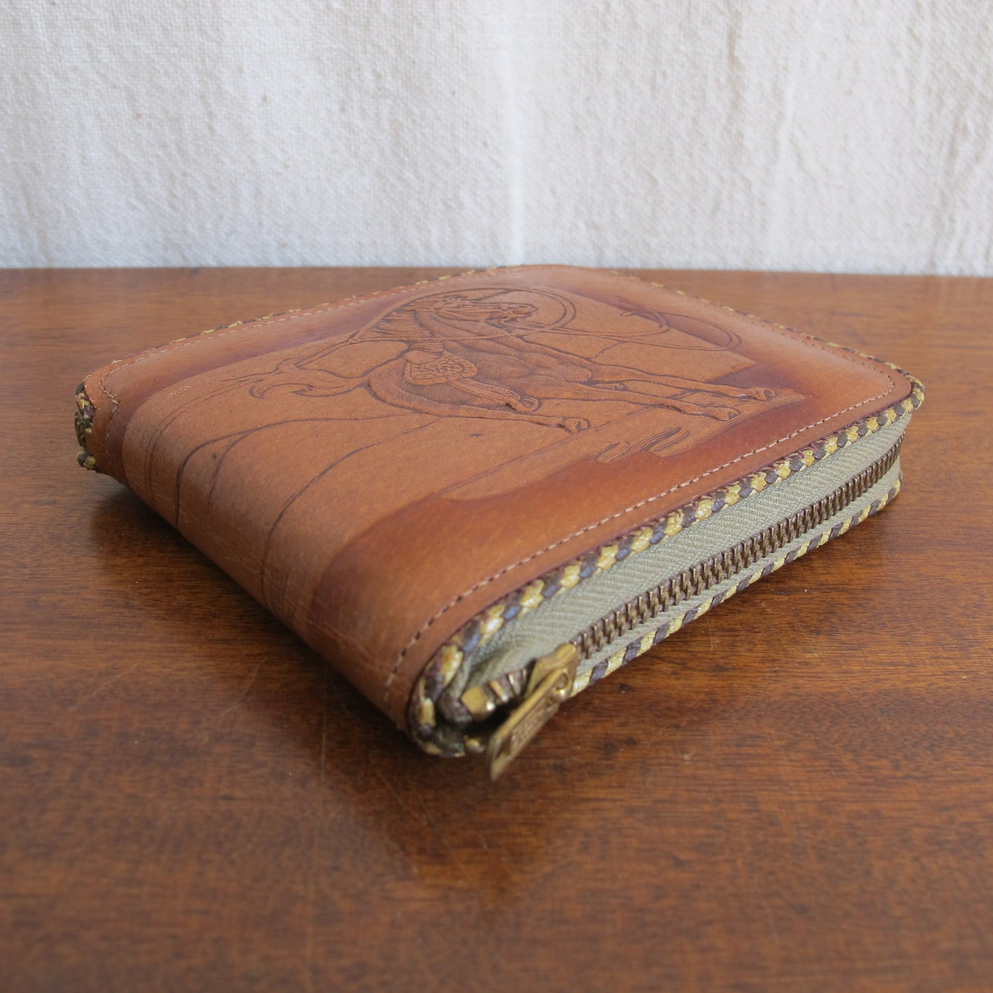 Wallet in tooled pigskin leather cowboy and mustang horse being lassooed, by Hidecraft, perfect unused condition, c. 1940