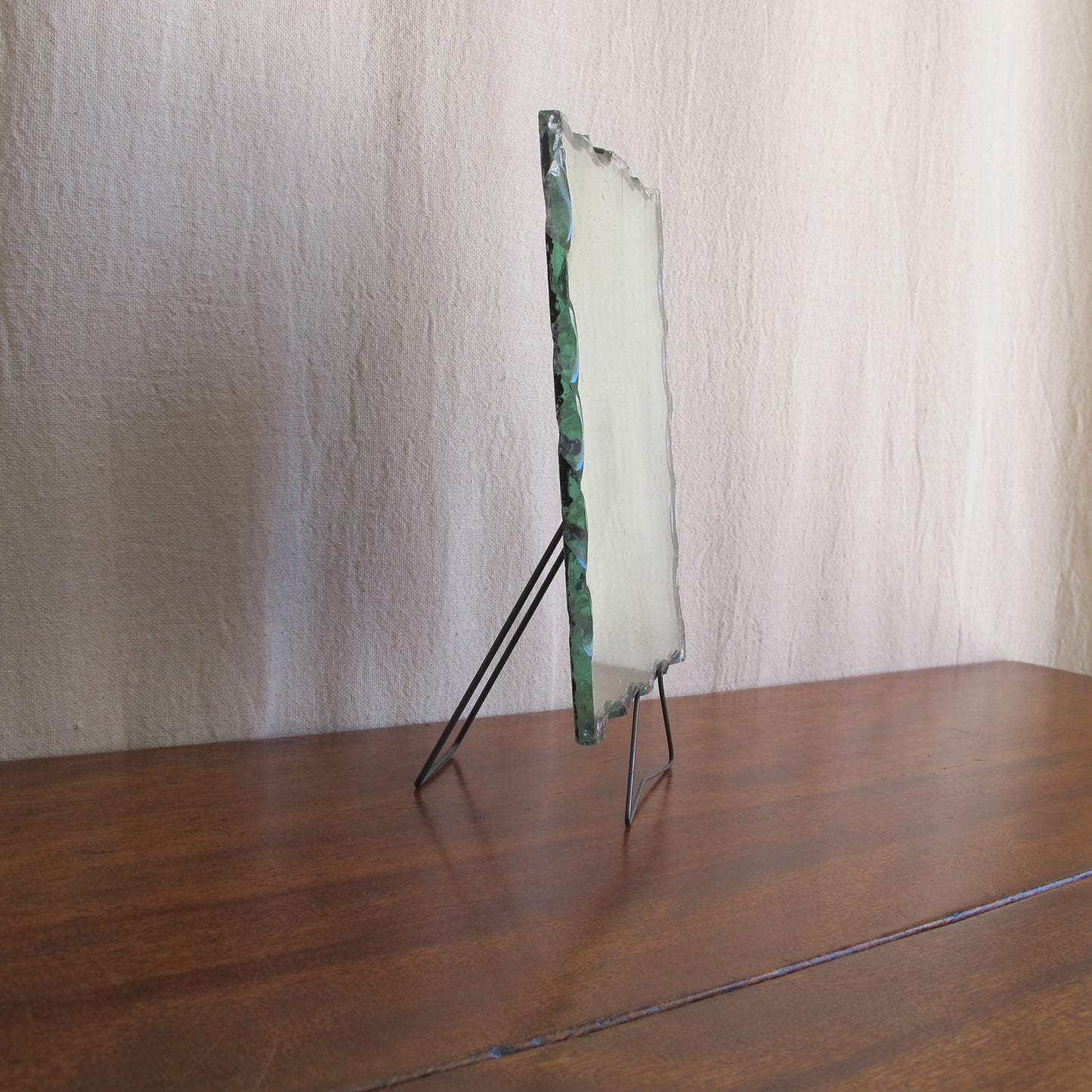 Edwardian dressing or shaving mirror, c. 1900 1910, with unusual intentionally chipped edges and wireframe stand, antique vintage