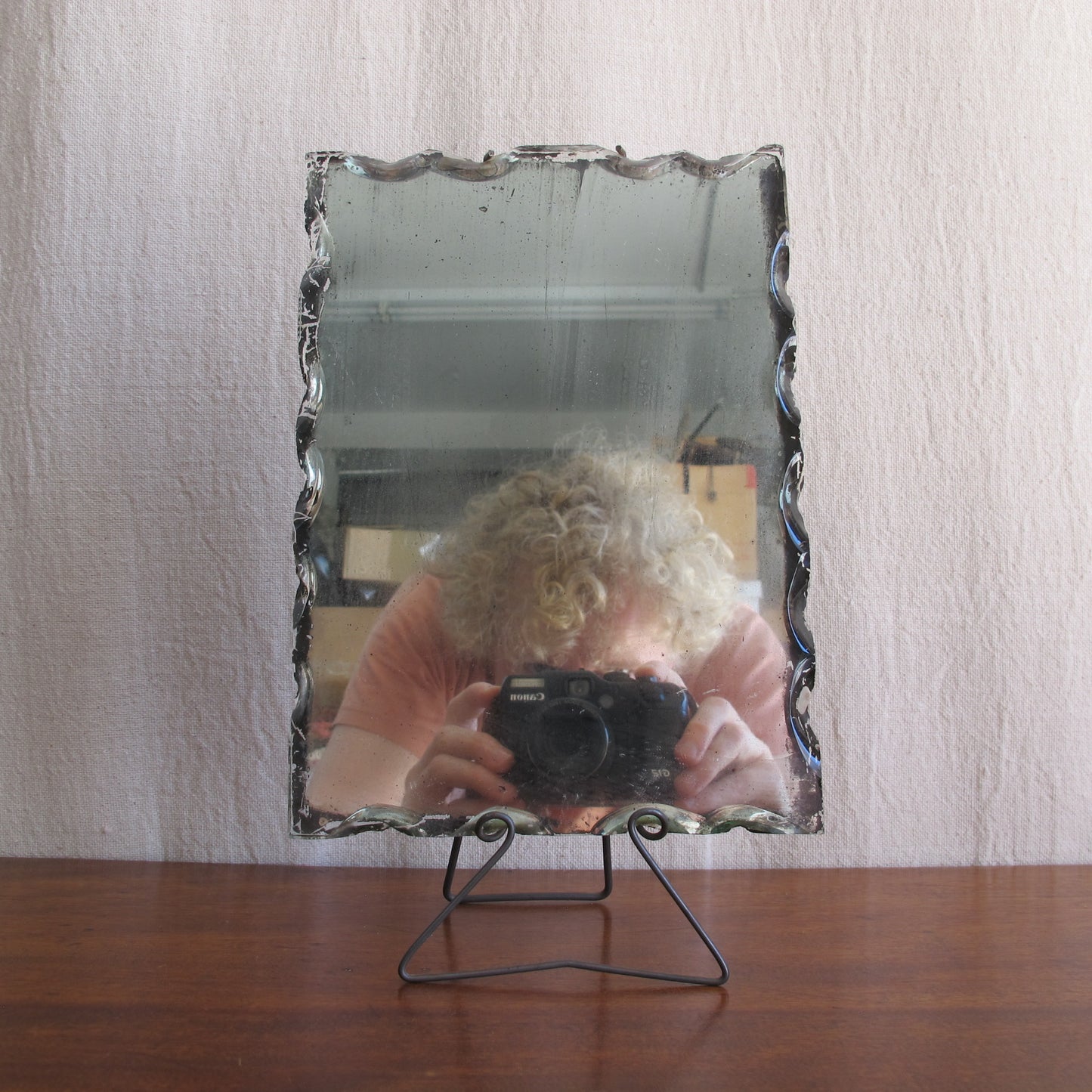 Edwardian dressing or shaving mirror, c. 1900 1910, with unusual intentionally chipped edges and wireframe stand, antique vintage