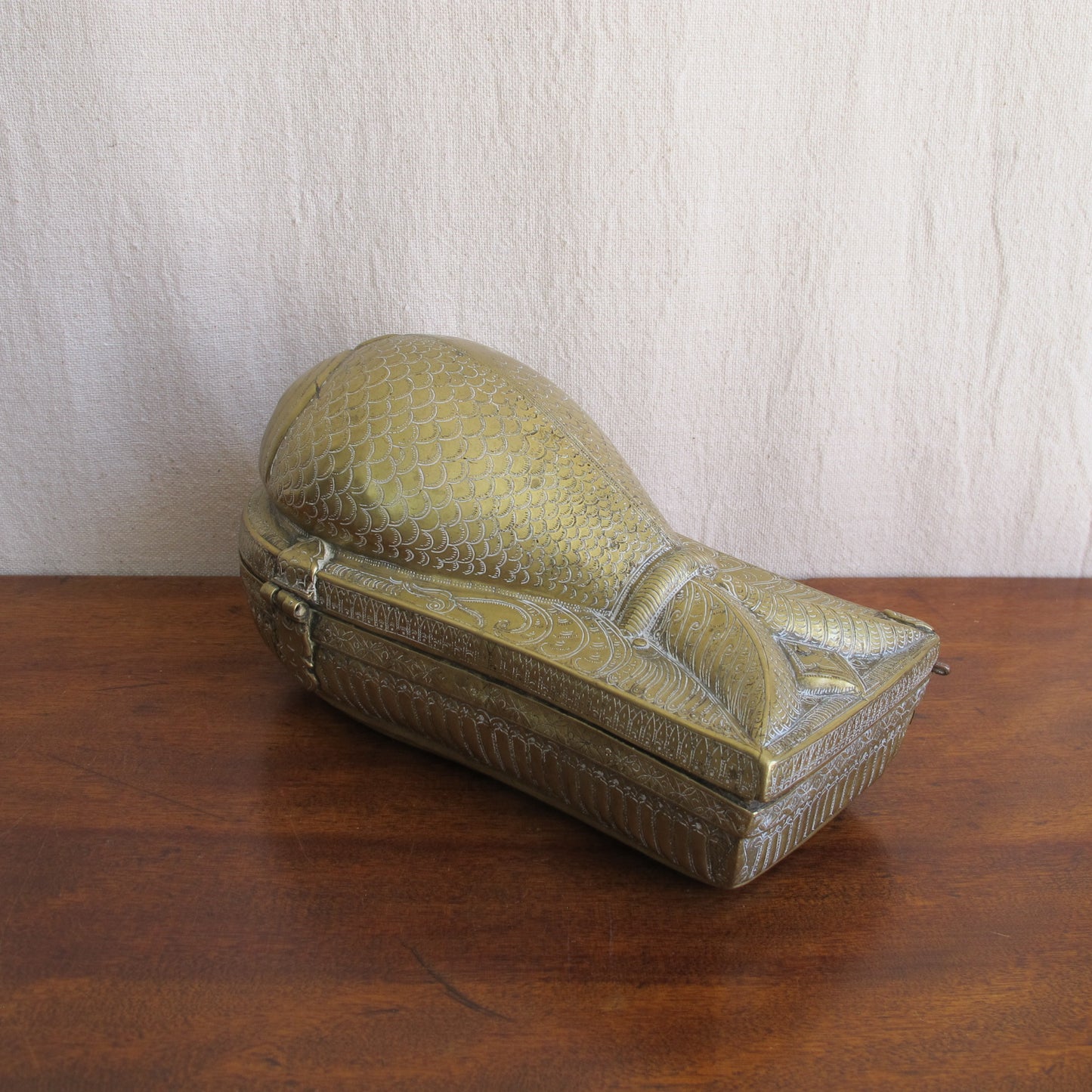 Indian betel nut lime paste box in chased and engraved brass in the form of a fish, early 19th century, vintage antique