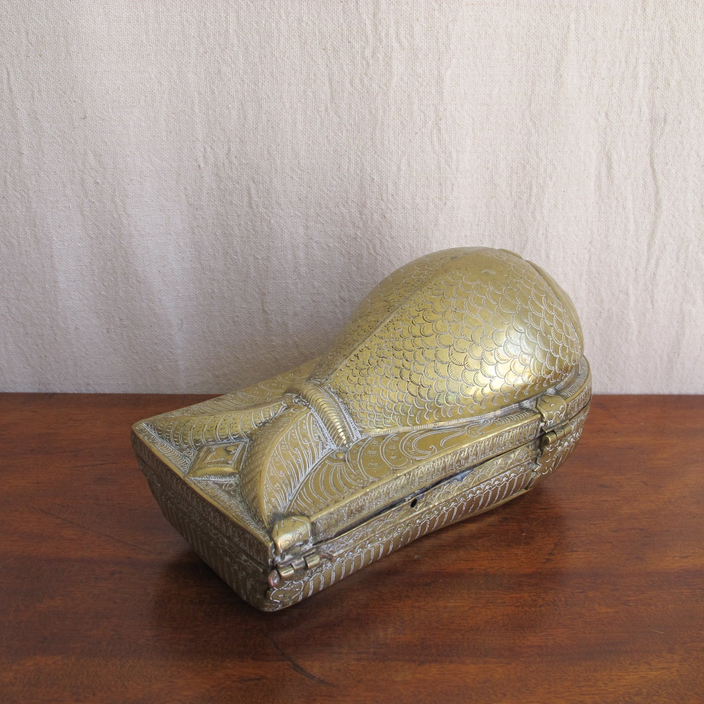 Indian betel nut lime paste box in chased and engraved brass in the form of a fish, early 19th century, vintage antique