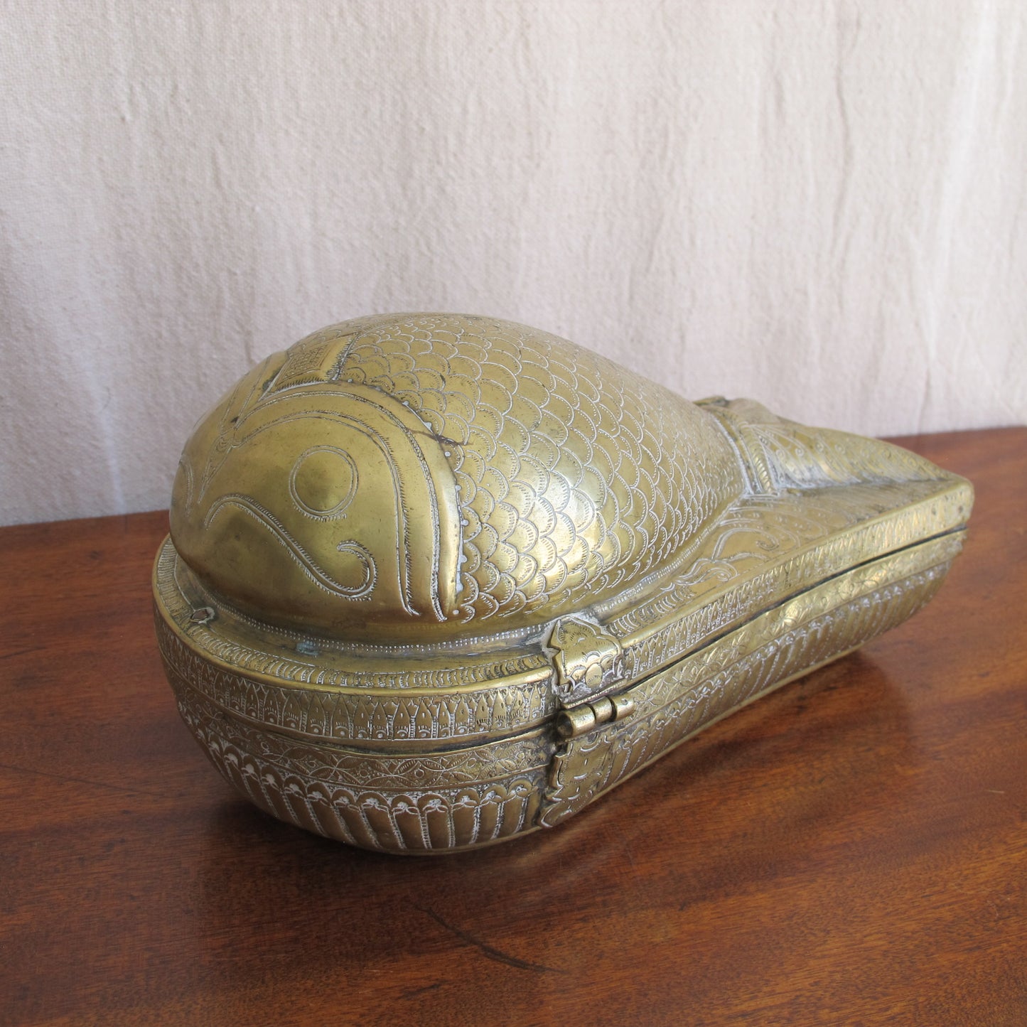 Indian betel nut lime paste box in chased and engraved brass in the form of a fish, early 19th century, vintage antique